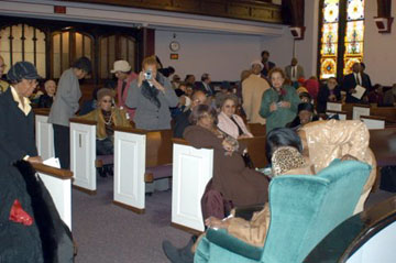 Mrs. Chappelle seated on her "throne"