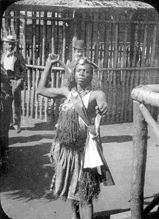 Boy dressed in traditional African attire.