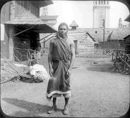 A man dressed in traditional African attire.