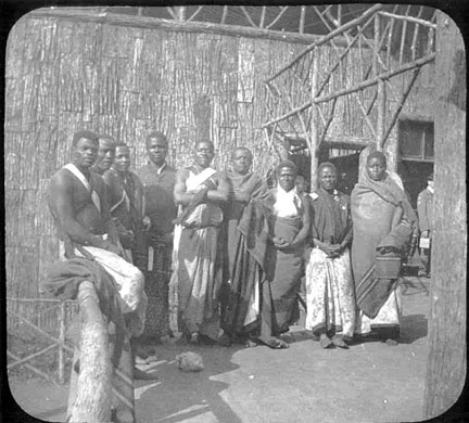 A group of people wearing traditional African attire.