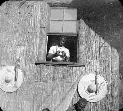 A man at a window.
