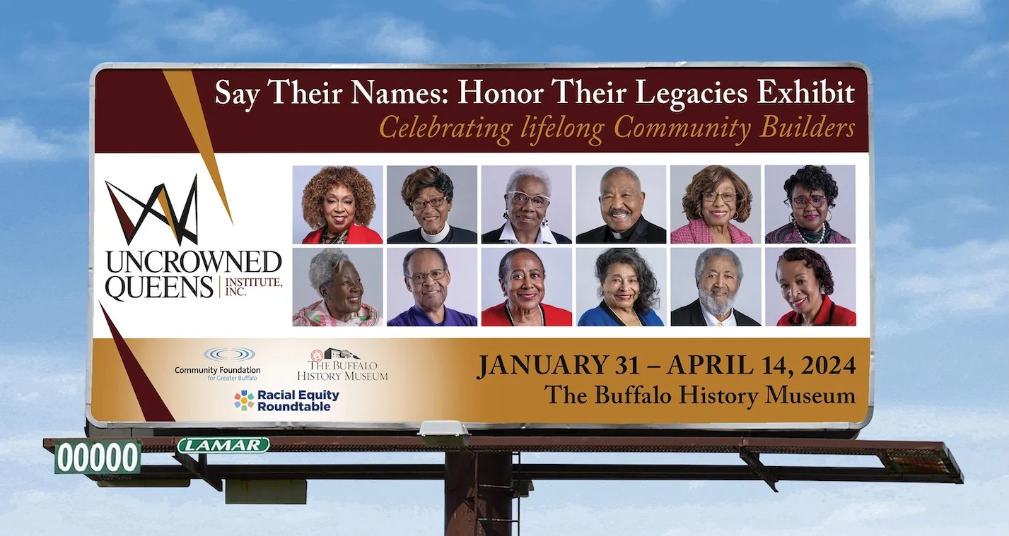 Billboard stating 'Say Their Names: Honor Their Legacies Exhibit.'