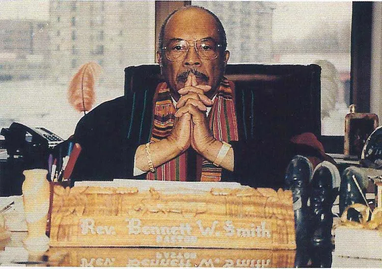 Rev. Smith at his desk.