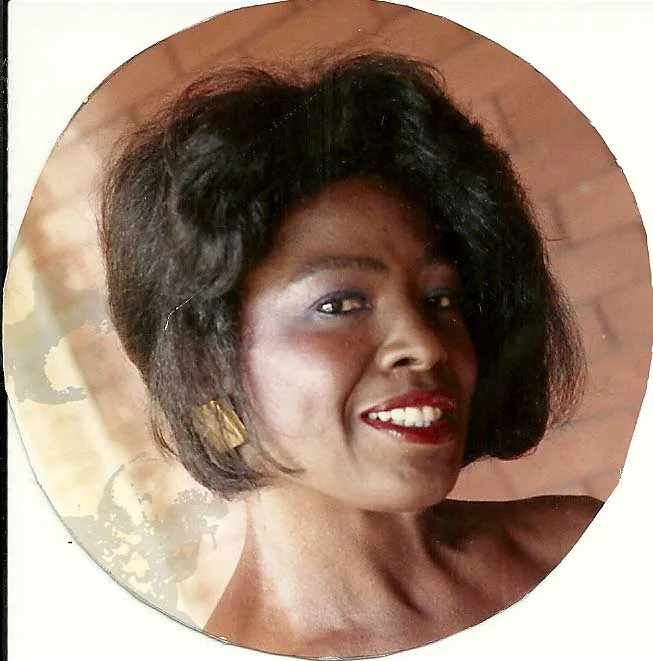 Peggy in 1992, front porch of her home