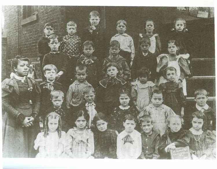 This photo pictures Ms. Fairbush with her students at School 6.  She was praised for her work with immigrant children and it appears that she did not teach any African American children.

This photo courtesy of Ms. Phyllis Chase