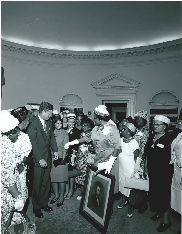 Mrs. Quick, a teenager at the time and a member of the National Association of Colored Women's Club teen group at the White House meeting with President John F. Kennedy, circa 1962