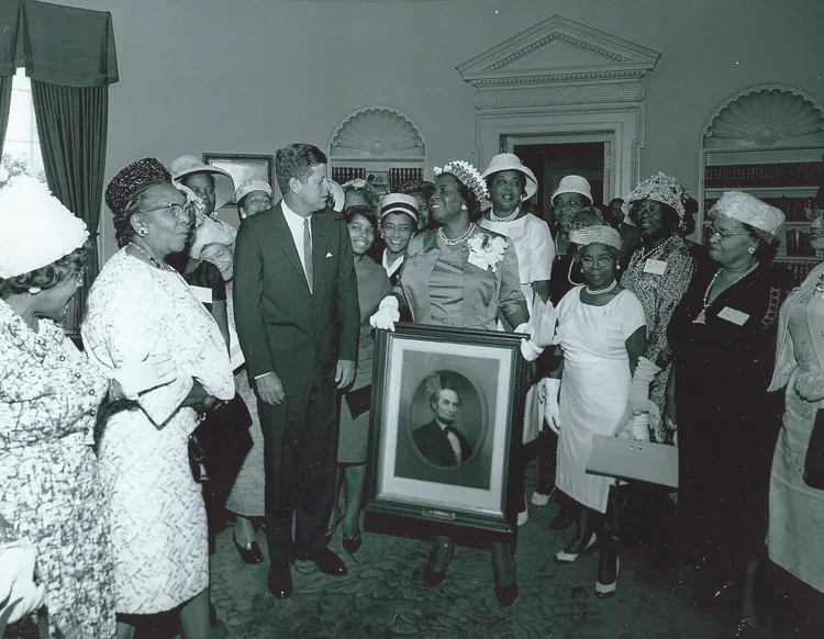 This photo features another view of the meeting with President Kennedy.
