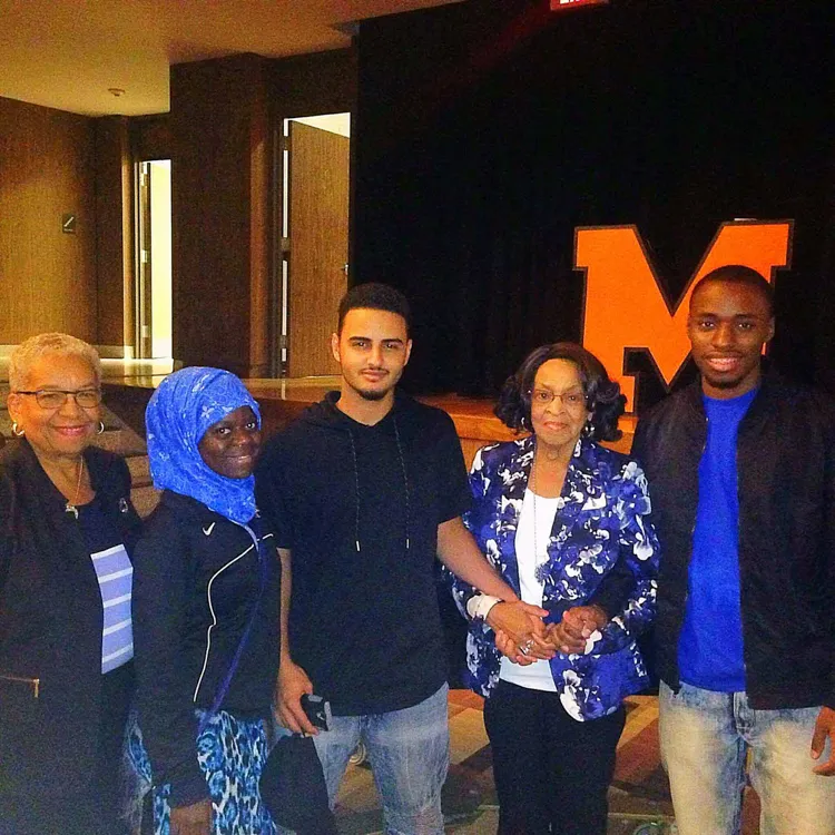 Mrs. McVay with students and Barbara Nevergold at McKinley High School.
