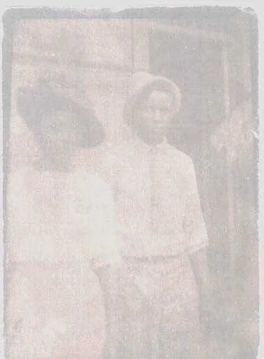 Old postcard photo of Emma and Gus Ellis taken in 1913.